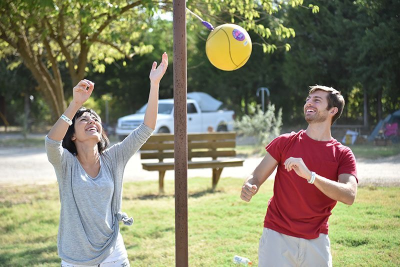 Playing tetherball at North Texas Jellystone Park